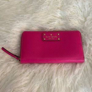Kate Spade hot pink wallet.